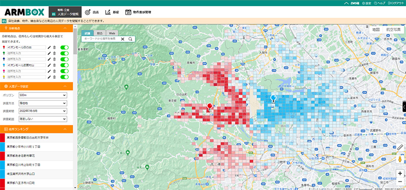 ArmBoxを使用して表示された大型商業施設の商圏範囲地図。赤色と青色のエリアが、商業施設の集客地域と顧客の分布を示しており、マーケティング戦略とテナント配置の最適化に活用できるデータを視覚的に提供します。